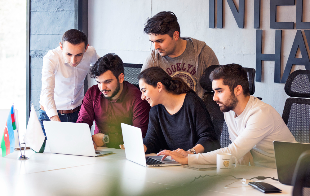 Architect peers reviewing a system design on a whiteboard